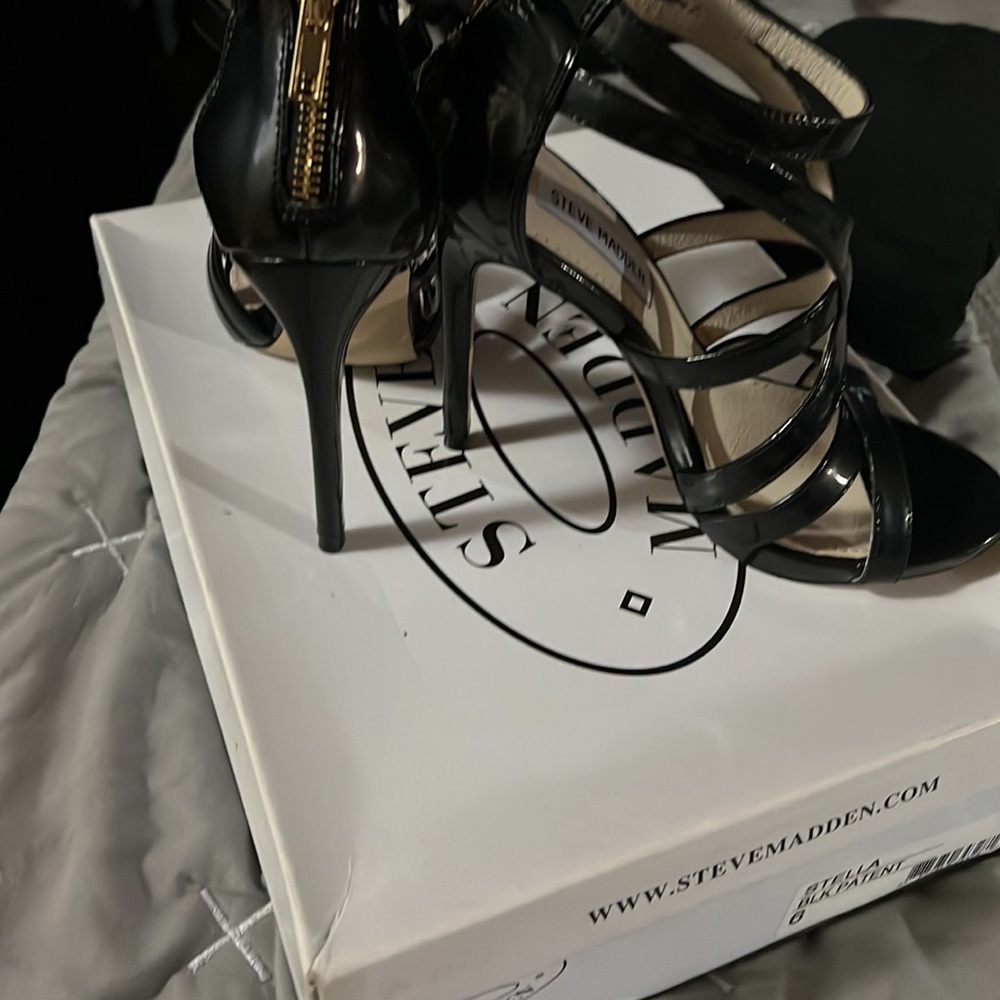 Black Steven Madden high heels .
